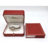 Ladies Cartier watch with steel and 18k gold roman numerals, original box and paperwork, in