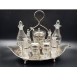 Antique 18th century solid silver 9 piece set with base tray cruet stand and bottle. Hallmarked