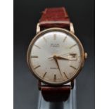 9ct Gold 1960-70s AVIA Gents DATE WATCH with Brown Strap 33mm. Manual in working condition Weight: