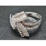 An 18K White Gold Diamond Split Ring. Size O. 5.1g 1ct.