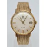 A Vintage 9K Gold Omega De Ville Gents Watch. Automatic movement. 9K gold strap and case - 34mm.