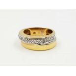 An 18k Yellow Gold Diamond Two-Level Band Ring. Size G. 0.2ct. 4.8g