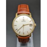 A Vintage 1960s 18K Gold Omega Gents Dress Watch. Mechanical - Wind Up Movement. Leather strap.