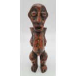 Antique 19th century African carved ivory fertility figure from the Lega tribe in the Congo.