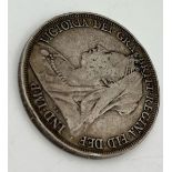 An 1895 Queen Victoria Silver Rocking Horse Crown Coin. 28g. Condition as per photos.