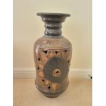 A Large African Stone (possibly terracotta) Vase. Pierced decoration. 61 x 28cm.