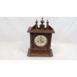 An Antique Wood and Gilded Dial Mantel Clock. Needs some repair work so A/F. 32 x 46cm.
