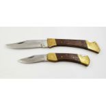 Two Very Good Condition Vintage Wood and Brass ?Buck? Style Lock Knives 14cm & 18cm long.