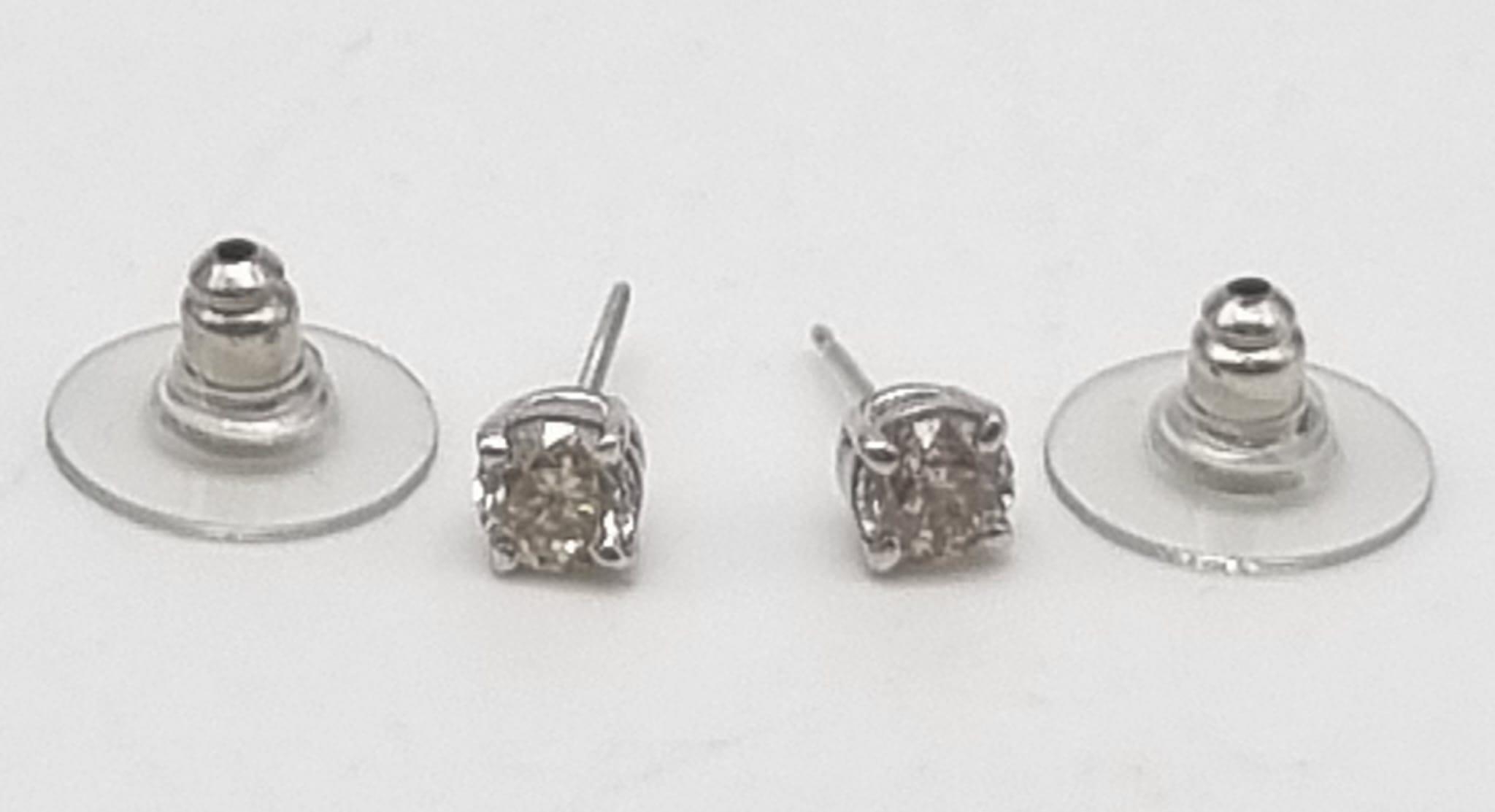 A Pair of 18K White Gold Diamond Stud Earrings. 1.0ct. N-I1 Grade. 1.27g total weight. - Image 5 of 6