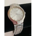 Gentlemans ACCURIST QUARTZ WRISTWATCH in silver tone having Silver coloured digits with sweeping