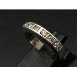 An 18K White Gold Diamond Half Eternity Ring. 0.25ct. Size M. 6g