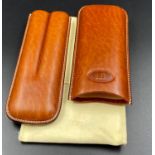 A high quality DUNHILL, tan leather, smooth, cigar case, embossed with the elegant Dunhill logo.