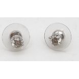 A Pair of 18K White Gold Diamond Stud Earrings. 1.0ct. N-I1 Grade. 1.27g total weight.