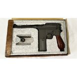 A Mauser Broom Handle C96 C02 Pistol. Made by Umarex. Excellent condition, in original box with