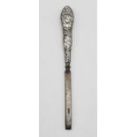 An Antique Silver-Handled Pair of Tweezers. Cherubic decoration. 11cm total length. 11.92g