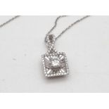 An Italian 18K White Gold Disappearing Necklace with Gold and Diamond Pendant. Diamond - 0.35ct.