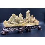 An Antique Chinese Hand-Carved Soapstone Landscape Sculpture - Portraying a small village within a