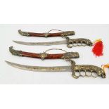 A Pair of Fantasy Display Swords. Both with scabbards and wolf decoration throughout. 56cm length.