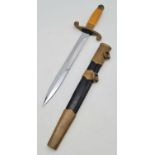 An Original Russian Soviet Military Dagger. Early 20th century. Black leather scabbard with brass
