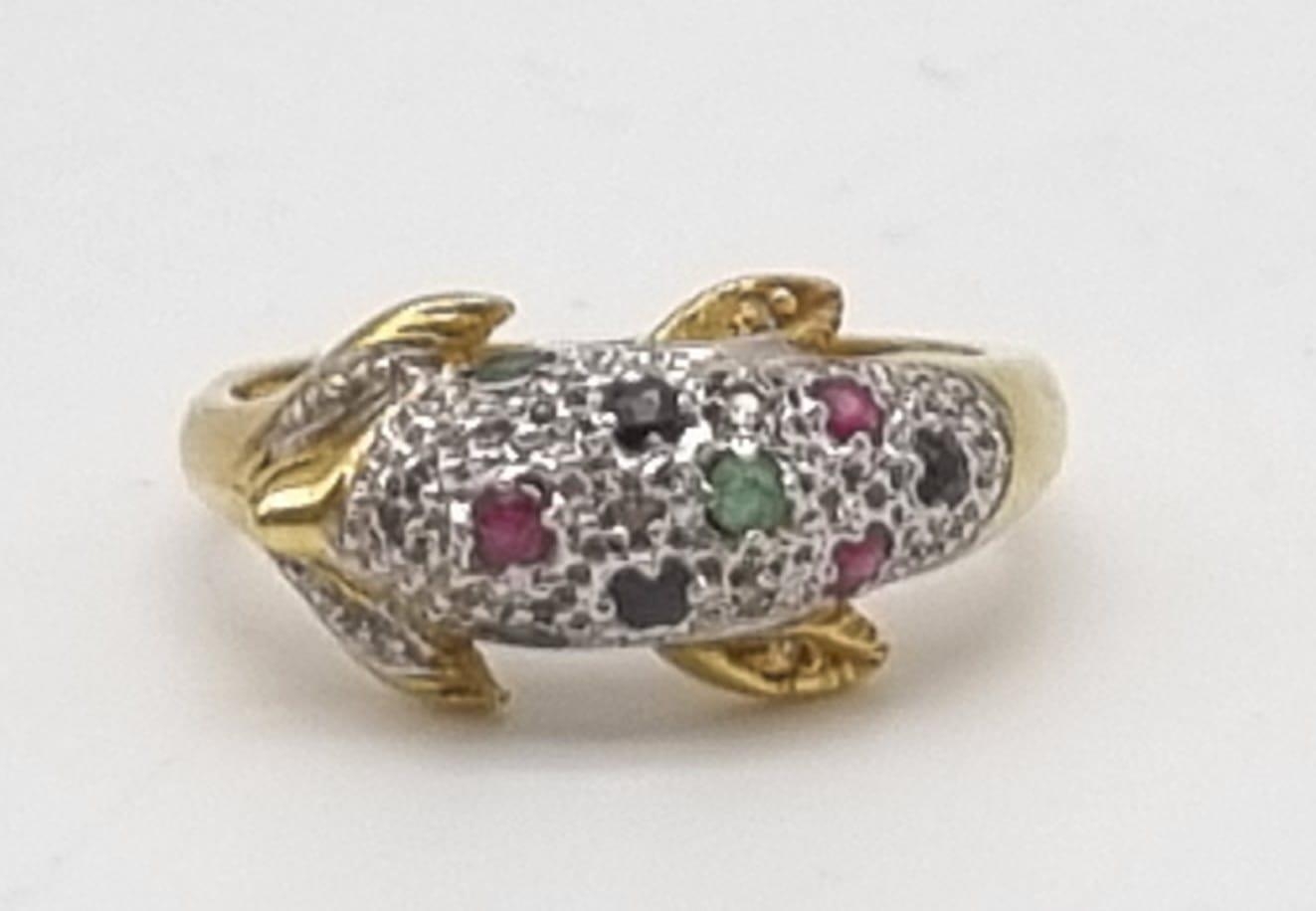 An 18K Yellow Gold Diamond and Precious Set Stone St Dolphin Ring. Size M. 4g