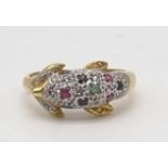 An 18K Yellow Gold Diamond and Precious Set Stone St Dolphin Ring. Size M. 4g