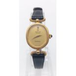 A Marvin Revue Ladies Wristwatch. Black leather strap and gold plated case - 16mm. Quartz