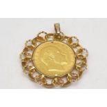 A 1904 22k Full Gold Sovereign Coin Encased in a Decorative 9K Yellow Gold Pendant Backing. 10.75g
