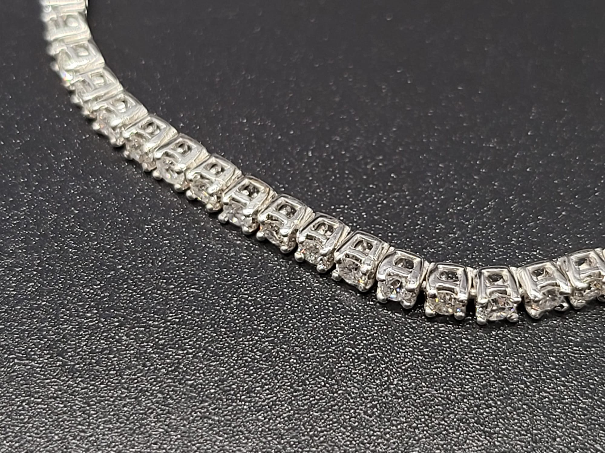 An 18K White Gold Diamond Tennis Bracelet. 3 - 3.2ct of diamonds. IJ -SI Grade. 8.43g. 18cm - Image 2 of 7