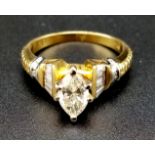 An 18 K yellow gold ring with a variety of diamonds. Ring size: P, weight: 6 g.