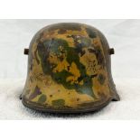 WW1 Imperial German M17 Helmet with ?Oakleaf? style camouflage. The liner band is remaining but