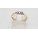 An 18K Yellow Gold Diamond Three Stone Ring. Size M1/2 0.11ct. 1.9g