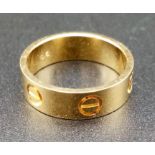 An 18 K yellow gold CARTIER ring from the LEVE collection , symbolising everlasting love, with