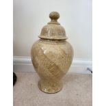 A Large Beige Polished Stone Urn with Bell-Shaped Lid. 40 x 20 cms.