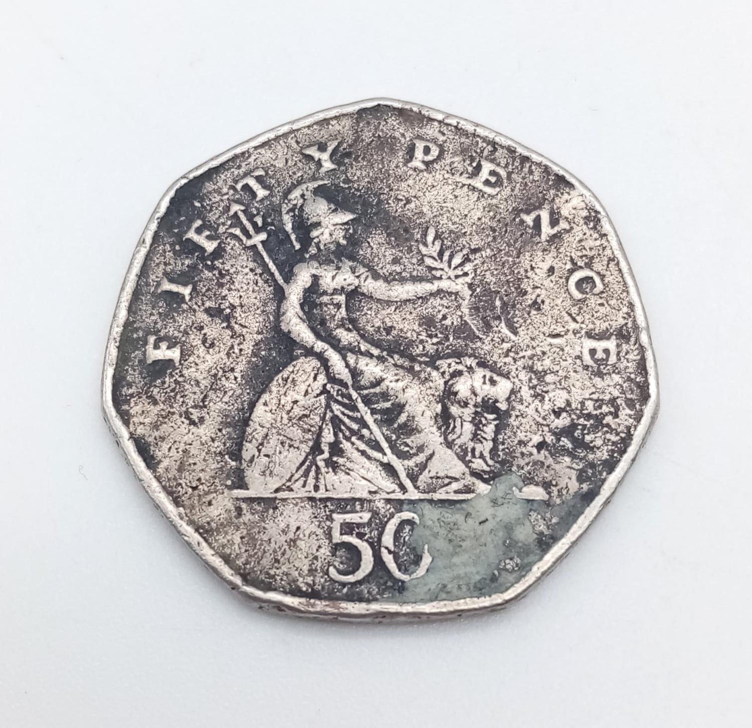 A circulated 1997 UK 50 pence, this is the first of the smaller coins and also the last coin with - Image 2 of 2
