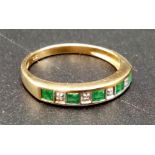 A 9K Yellow Gold Emerald Band Ring. Size P. 1.94g