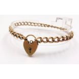 A 9K Yellow Gold Small Twisted-Curb-Link Bracelet - with a heart clasp. 18cm. 12g