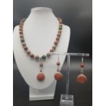 A rare necklace and earrings set with jasper and fossil red horn coral (300 million years old)