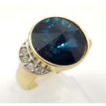 A Gold Plated Blue Quartz and Moissanite Ladies Dress Ring. Size K