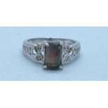 9ct white gold ring with black opal and diamonds, ring size N, total weight 3,7 grams.