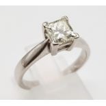 An 18K White Gold and Diamond Solitaire Ring. Square cut bright white diamond - 1.02ct. J-SI