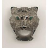 An impressive, statement, diamond ring in the style of Cartier Panther. With over one thousand