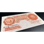 A 1955 O'Brien First Series Ten Shilling Note. D892 909587. B271. Uncirculated condition in a