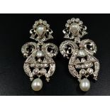 A Vintage pair of earrings with genuine pearls and cubic zirconia. Drop: 5 cm.
