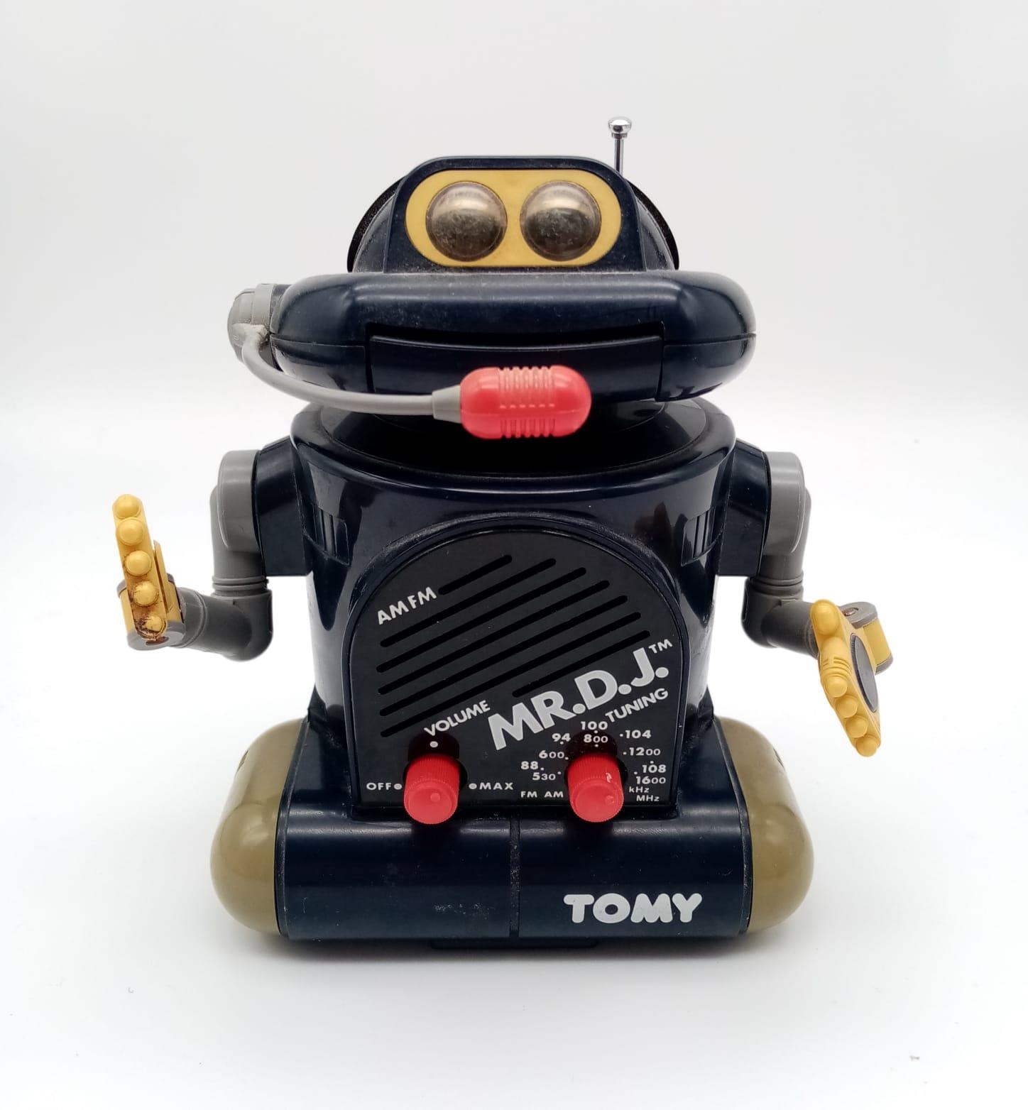 A Vintage Tomy Mr.D.J AM/FM Robot Radio. 17cm tall. As found.