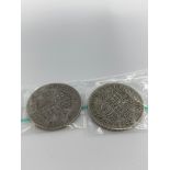 Pair of World War II HALF CROWNS in extra fine condition having clear and bold definition with