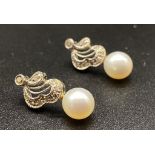 A Pair of 18K White Gold Diamond and Pearl Earrings. 3.43g total weight.