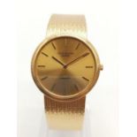 18K gold Patek Philippe Geneve quartz watch with solid gold strap, 34mm case Weight: 82g