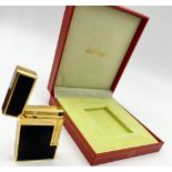 A Dupont ST Black Enamel and Gold Plated Plume L2 Lighter. As new, in original box with documents.
