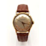 A Rare Vintage Girard-Perregaux Gyromatic Gents Wrist Watch. Brown leather strap with a gold