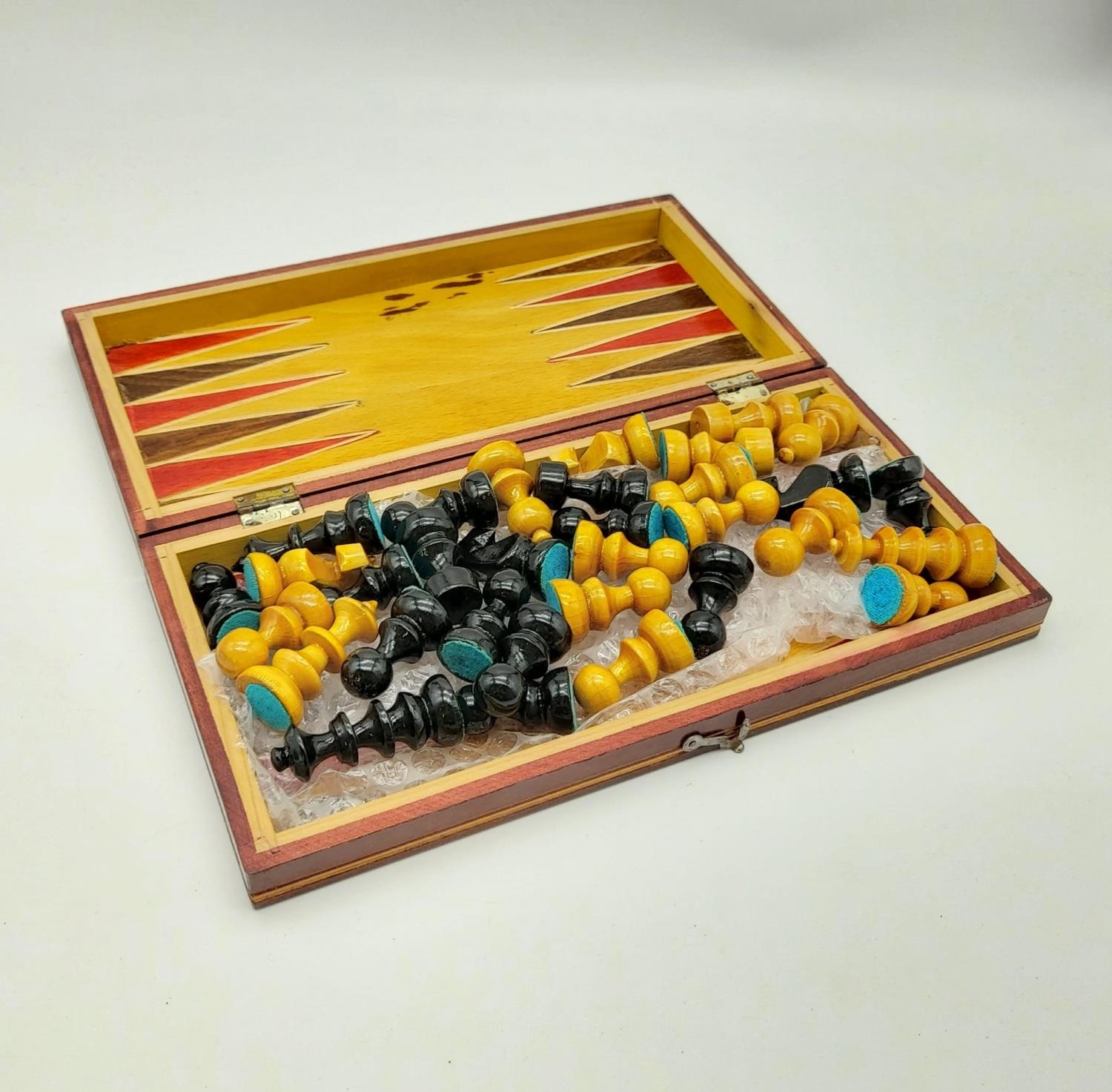 A Vintage Wooden Chess Set with Folding Board. Backgammon board on interior. 26 x 26cm.